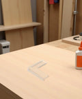 8Pcs Silicone Corner Bumpers for Furniture and Table Edges Easy Install Anti Collision Guards on a wooden table in a workshop setting.