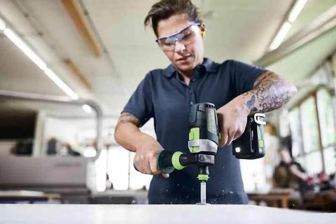Person using Heavy Duty Cordless Percussion Drill With Real Deal Masonry Punching Power And Smooth Woodworking Flow Including Forstner Bit Compatibility Plus No Nonsense Workhorse Design Tool Only for drilling.