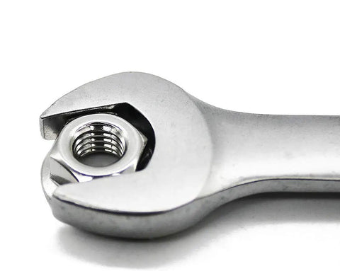 Close-up of a wrench gripping an 8 Pack Slick M10 X 1.25mm Fine Metric Hex Flange Nut Built From Tough 304 Stainless Steel.