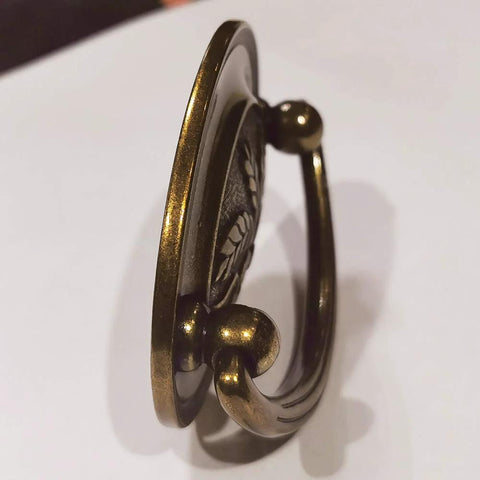 Antique Brass Bail Drawer Pull Set Four Pack Oval Drop Swing Handles For Cabinets, Zinc Alloy, side view showing oval swing handle.