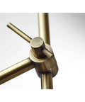 Close-up of the antique brass finish on the Vera LED Floor Lamp With Adjustable Height 46.5 To 61 Inches