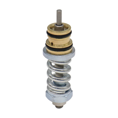 Close-up of Carbpro unloader valve kit: brass body with steel coil spring for high-pressure washer pumps