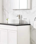 Modern Vessel Sink Faucet In Brushed Nickel Tall Waterfall Style Bathroom Mixer Single Handle With Pop Up Drain And Three Eighths Inch Hoses Clean Minimalist Look For Contemporary Bathrooms in marble and black counter setup