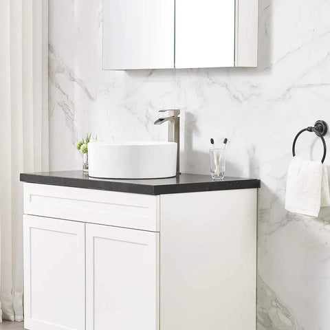 Modern Vessel Sink Faucet In Brushed Nickel Tall Waterfall Style Bathroom Mixer Single Handle With Pop Up Drain And Three Eighths Inch Hoses Clean Minimalist Look For Contemporary Bathrooms in marble and black counter setup