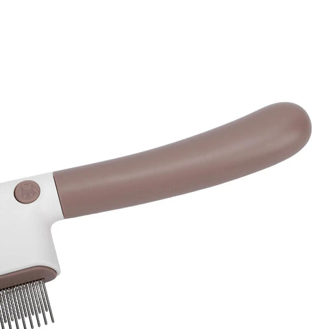 Ultimate Pet Grooming Kit For Dogs Includes Self Cleaning Deshedding Brush And Combs To Slash Shedding And Keep Fur Soft For Long Short Hair Breeds close-up handle and comb