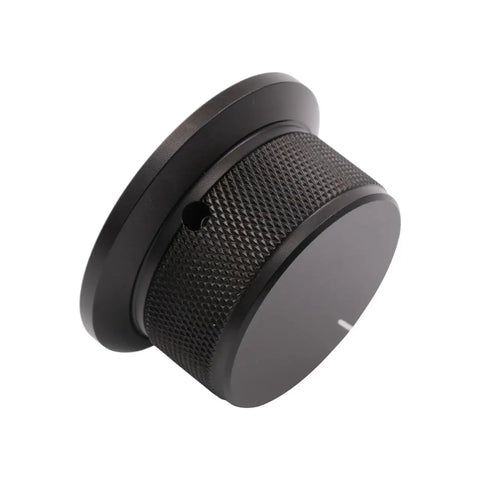 Heavy Duty Aluminum Volume Control Knob Featuring Slick Diamond Knurled Grip For Pro Level High End Audio Amplifier And Turntable Buttery Smooth Rotation Top Shelf Replacement Dial in black with textured grip.