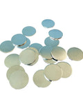 Slick Nickel Coated Steel Discs.98 Inch Diameter With Smooth Chamfered Edges Rock Solid Blanks ready to roll in a scattered layout.