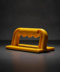 Built Tough Woodshop Push Handle Safety Guide Block With Reinforced Frame And Grippy Bottom For Steady Feed Control On Table Jointers And Thickness Planers, yellow plastic push block.