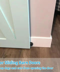 Sliding barn door shown with magnetic door stop for pets