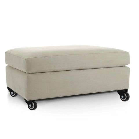 Heavy Duty 2 Inch Swivel Furniture Caster Wheels With Plastic Plate gliding smoothly under a beige ottoman for easy movement.