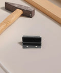 Omega Shaped Alloy Steel Grafting Blades Two Piece Set shown with tools on a workbench.