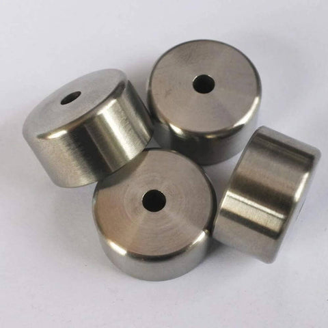 2 pcs water jet poppet seats; stainless steel round discs with central hole.