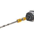 Side view of socket extension rod with hex adapters and gold sleeves attached to a cordless drill.