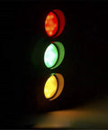 Remote Control Traffic Light Wall Lamp Triple Light 19 Inch Tall Industrial Retro Dope Sconce LED Bulbs Included Black Finish Energy Saving 5W Remote Great For Kitchen Dining Room Or Hallway Decor And Ambient Lighting, glowing traffic light styling in darkness