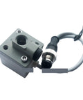 Close-up of Go-To Pneumatic Pressure Switch For Industrial Automation with gray housing and connector cable, rugged design.