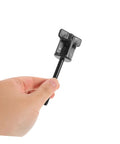 Hand holding a Spare Tire Hold Down Bolt Retainer Clamp For A Tough Secure Fit Built To Last Durable Tire Fixing Screw in black color