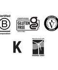 Certification badges for Target Mins Calcium Magnesium Complex, including gluten-free, vegan, and renewable energy icons.
