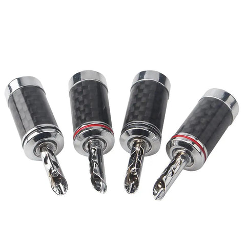 Top Shelf Banana Plugs Quad Pack With Secure Screw Lock Mechanism And Smooth Carbon Fiber Shell For Crisp Signal Transfer, showing four connectors.