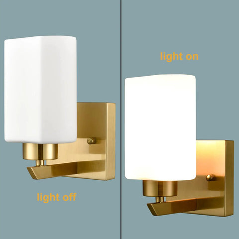 Side-by-side view of modern gold wall sconce vanity light with milky white glass shade set of 2 for bathroom and bedroom.