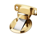 Gold Invisible Magnetic Door Stopper With Wall Or Floor Mount Catch Keeps Bedroom Or Indoor Doors Locked In Place At Set Angle For Hidden Sleek Installation And Smashing Home Vibe, close-up of gold stainless steel design.