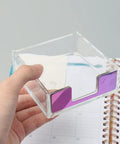 Holding clear sticky note dispenser from Magnetic Paper Clip Holder And Clear Sticky Note Dispenser Set For Your Desk 100 Clip Capacity Post It Note Organizer Rainbow Acrylic Desk Accessory With Modern Rainbow Finish For Office
