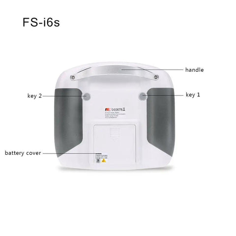 Back view of 10 Channel 2.4G AFHDS 2A RC Transmitter With FS iA6B Receiver showing battery cover and keys for quadcopter control