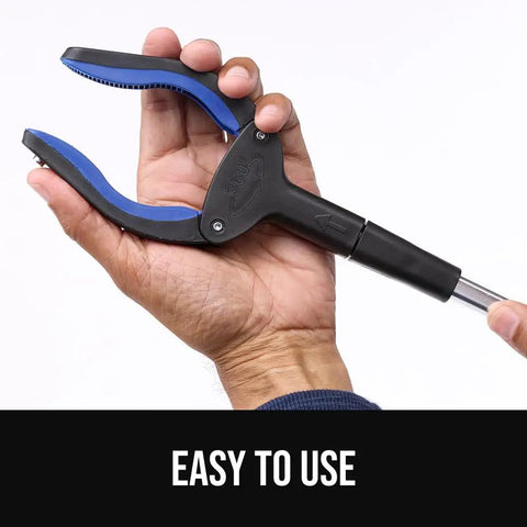 Close-up of hand holding Strong Rubber Lined Claw Grabber Two Pack Reacher Tool for Seniors With 360 Magnetic Rotating Head