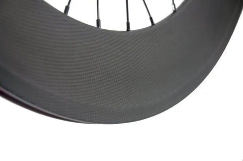 Close-up of the Full Carbon Fixed Gear Wheelset 700C 88mm Track Clincher Matte Finish for Dope Street Rides showing the rim detail.