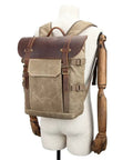 Canvas DSLR Video Backpack With Waterproof Outdoor Design on mannequin, shock resistant shell, adjustable straps visible