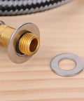 Close-up of an installed washer and a separate washer from 180 Piece Stainless Steel Flat Washer Set M2 To M10 For Fastening DIY Repairs Gasket Spacers