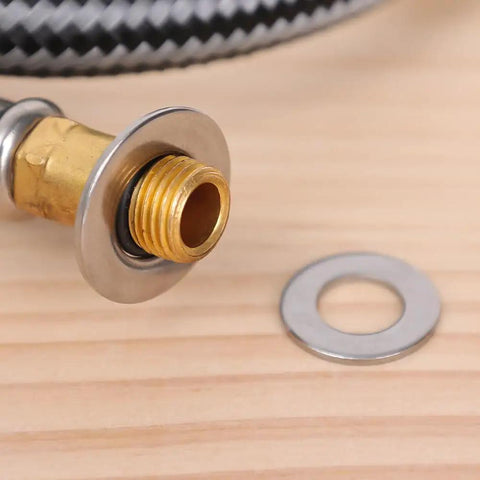 Close-up of an installed washer and a separate washer from 180 Piece Stainless Steel Flat Washer Set M2 To M10 For Fastening DIY Repairs Gasket Spacers