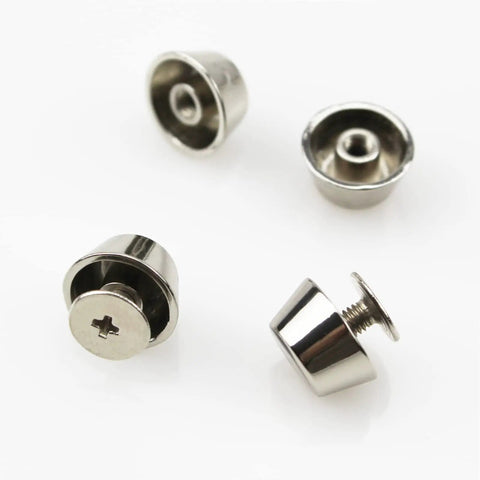 Top Shelf Heavy Duty Brass Purse Feet With Crisp Silver Rivet Screws For Handbags Knockout Bag Bottom Studs and Badass Pro Grade Leg Hardware Kit For Leather Craft, showing four shiny brass purse feet with screw backs.