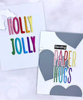 Shadow 26 Capital Letters Metal Cutting Dies For Card Making Kit with colorful 'Holly Jolly' and 'Paper Hugs' on greeting cards