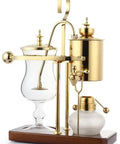 Premium Manual Coffee Brewer With Heat Proof Borosilicate Glass And Food Safe Stainless Steel Pour Over Set For Home Office Smooth Sipper Game Changer Gold Edition on wooden base.