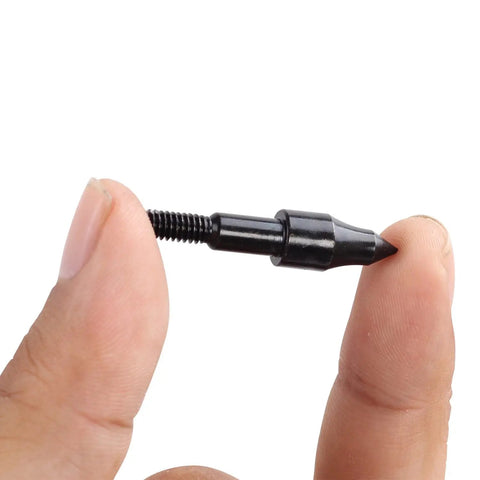 Close-up of Pro Grade 100 Grain Field Points for target practice, stainless steel screw-in tip, held between fingers.