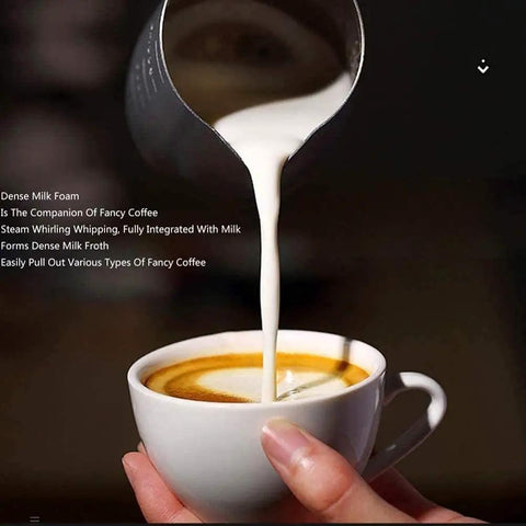 Pouring dense milk foam into coffee cup highlighting creaminess and texture for barista-quality coffee.