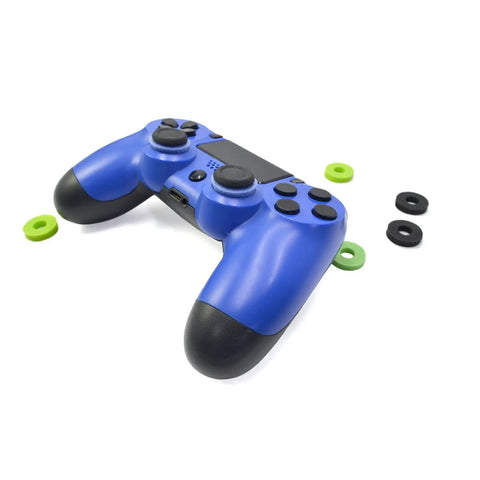 Blue game controller with Ten Pack Controller Aim Assist Rings For Thumbsticks With Sponge Motion Control Grips scattered around