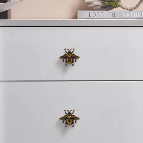 Bee Cabinet Knob Set Solid Four Pack Bumble Bee Insect Drawer Pulls Zinc Alloy Bronze Finish on white dresser