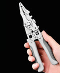 Rugged Stainless Steel Wire Stripper And Cable Cutter Pliers Quick Release Jaw multitool held in hand, showcasing precision gripping and comfort grip design.