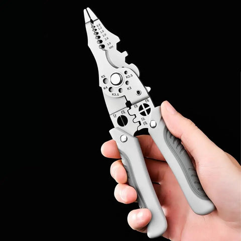Rugged Stainless Steel Wire Stripper And Cable Cutter Pliers Quick Release Jaw multitool held in hand, showcasing precision gripping and comfort grip design.