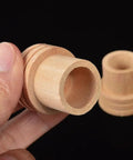 Professional Grade Moxa Stick Extinguisher And Wood Snuffer For 1.8 Cm Cigars, wooden moxa extinguisher held in hand