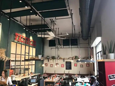 Heavy Duty Ten Foot Wide Area Cooling Fan With Brushless Motor And Built In VFD Drive For Factory Breeze, installed in a restaurant setting.