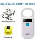AR180 Pet Microchip Reader For Dogs And Cats next to animal glass tube chips and ear tag, showcasing RFID technology.