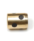 Badass One Piece Sleeve Bearing With 5Mm Inner Bore And 9Mm Outer Diameter At 12Mm Long with black dots on bronze surface.
