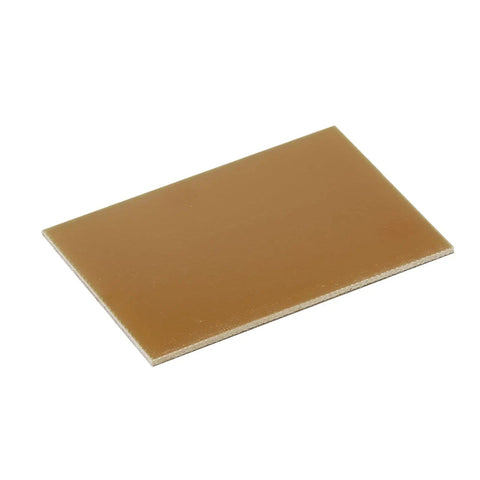 Five Piece FR4 Copper Clad PCB Boards Single Sided Blank For DIY Electronics Etching And Circuit Projects Great For Hobbies Pack Includes 70mm By 50mm By 1.5mm, single board angled view
