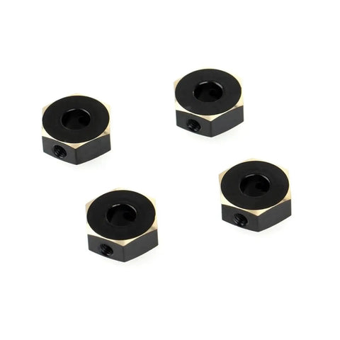 Four CNC brass 12mm wheel hexes for Axial Capra SCX10 II Pro RC crawlers, enhancing steering stability and traction on trails.