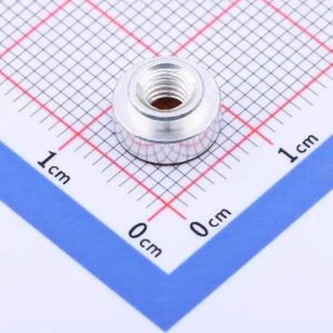 Top Shelf Solid Build Hardware Copper Tinned Smd Round Nut Spacer M4 X3 on a grid background for PCB projects.
