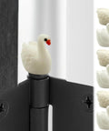 Whimsical Mini Swan Hinge Head Magnets Set Of 6 For Door Decor And Metal Surfaces perched on a hinge pin