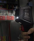 Side view of Handheld Thermal Imaging Camera With WiFi, 25Hz Refresh, 160x120 IR Resolution, inspecting electrical panel.