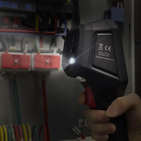 Side view of Handheld Thermal Imaging Camera With WiFi, 25Hz Refresh, 160x120 IR Resolution, inspecting electrical panel.